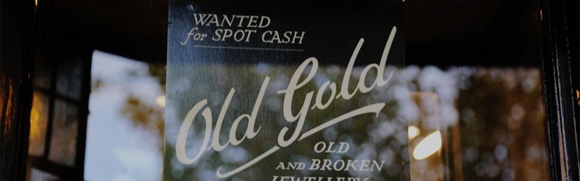 Cash for gold vintage window sign in jewellers